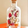 White And Red Flowers Inside A Bottle Diamond Painting